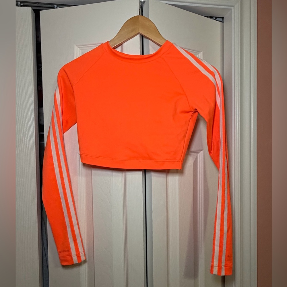 Ivy Park orange cropped Swim Shirt. Size Small. Built in bra shelf. Worn once